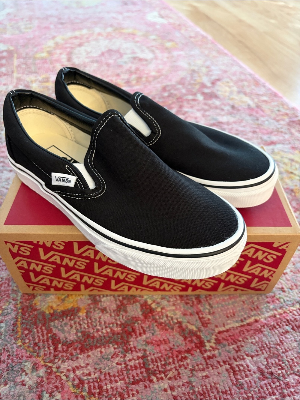 Vans Kids Slip-On Canvas Sneakers in Black and White
